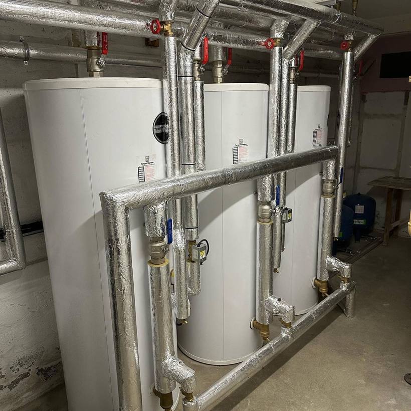 Three Telford Tempest calorifiers with insulated pipework
